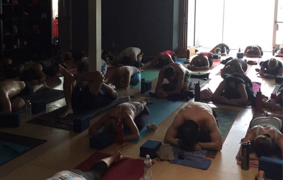 yoga class in child's pose
