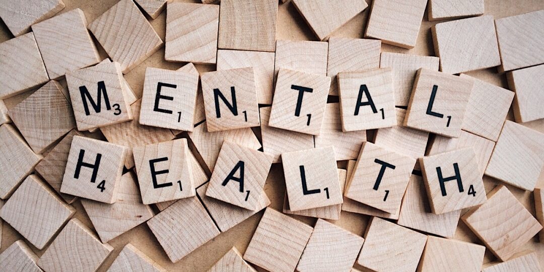 mental health spelled with scrabble pieces
