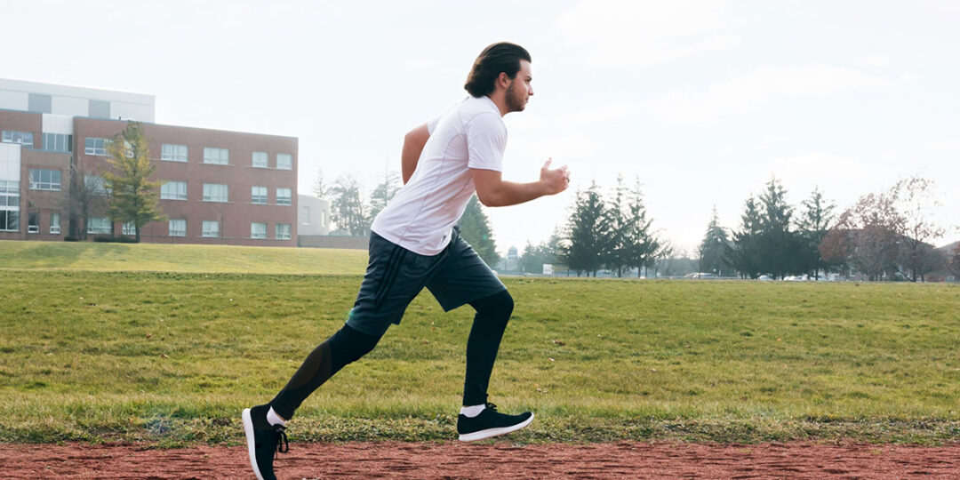 Man running at the track